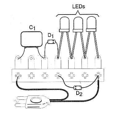 Figura 4 - Montaje del circuito basado en un pequeño puente de terminales. Observe que los cátodos (lado aburrido) se quedan a la derecha.
Figura 4 - Montaje del circuito basado en un pequeño puente de terminales. Observe que los cátodos (lado aburrido) se quedan a la derecha.